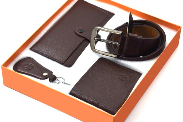 Leather gift set — wallet, belt and key fob in an orange box